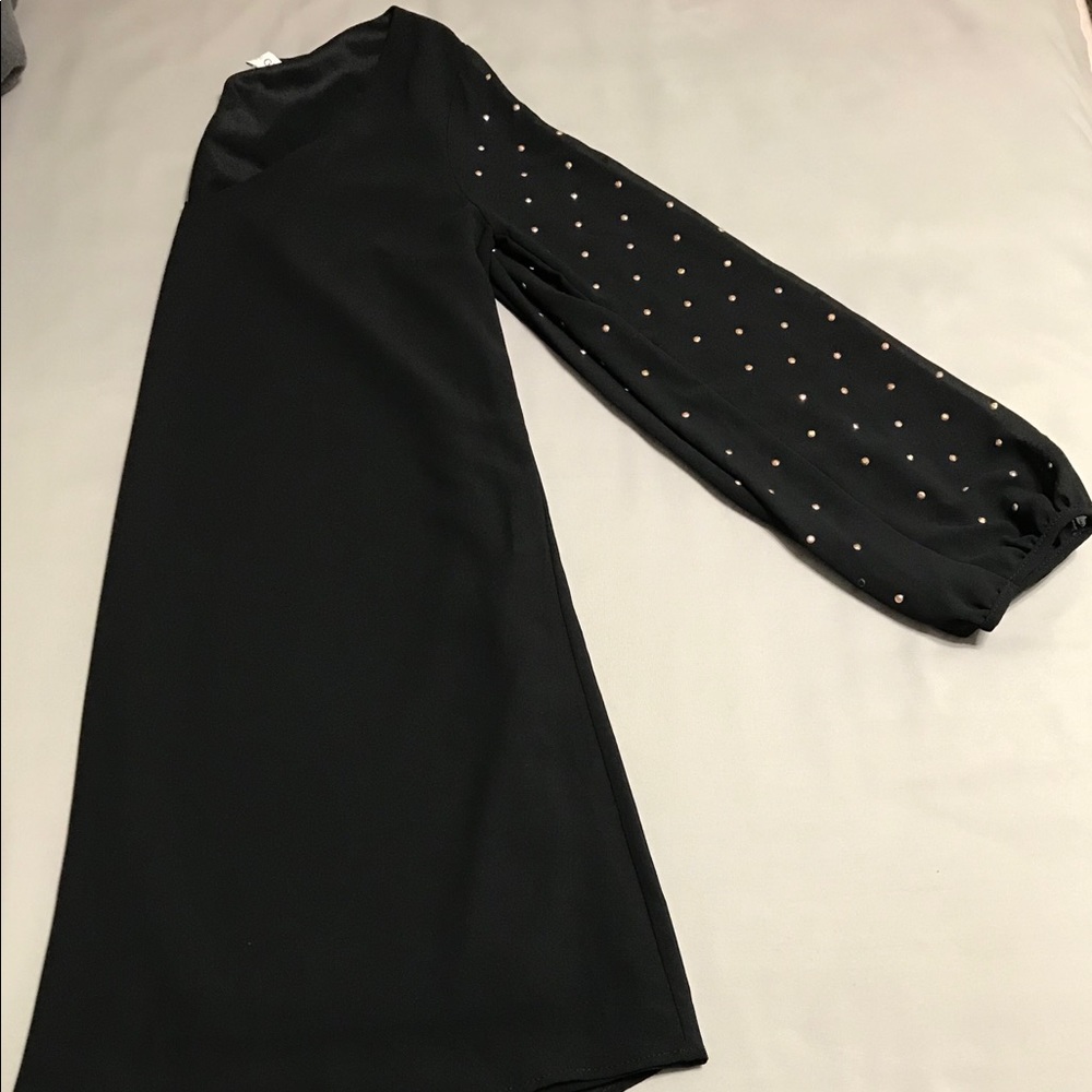 Black tunic with embellished sleeves